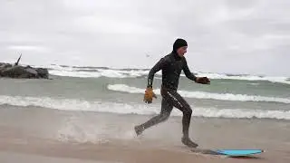 High winds, waves pull people to Holland's lakeshore despite weather advisories