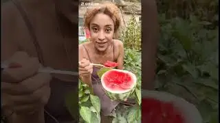 African Girl Loves Chinese Watermelon