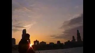 Dan Susek taking photos of the Chicago skyline at sunset.MP4