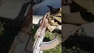Mobilization in Russia:  Close-up to rusted AK rifle of one of the 