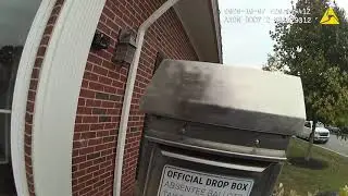 Axon Body 2 Dropping Off Absentee Ballot At City Hall