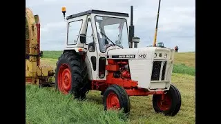 David Brown Tractors at work cutting grass  to make silage.