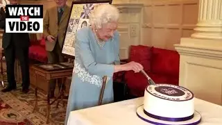 Queen Elizabeth cuts cake to mark 70 years of rule