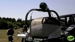 Pasikraunantis iš priekio rulonų vyniotuvas 