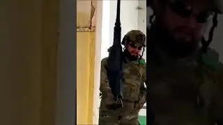 Ukrainian soldier carrying an M2 Browning up the stairs. #ukraine #russia #shorts