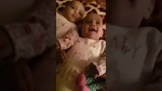 Twins learning how to talk to uncle
