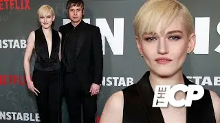 Julia Garner and Mark Foster rock black ensembles at Netflix premiere