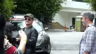 BONO of U2 Stops to sign autographs and take photos with fans