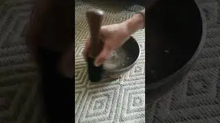 Amazing vibration of singing bowl when played with water inside