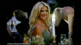 Victoria Silvstedt stuns in a khaki green dress with a VERY daring leg split at The Perfect World Fo