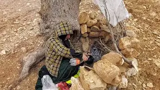 Asih is collecting firewood to warm herself in the bitter winter cold.