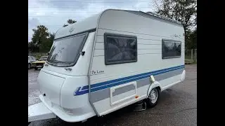 Обзор модного немецкого малыша-крепыша автодома Hobby De Luxe 2000 года 3-4 места с палаткой турист