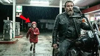 A Little Girl Runs Up To A Biker At A Gas Station: 