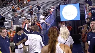 Auburn coach, Bryan Harsin and players celebrate after beating San Jose State