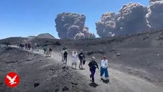 Mount Etna erupts in huge volcanic blast sending tourists fleeing