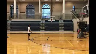7th grader shows how to shoot a 3 pointer using automatic rebounding machine
