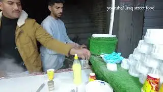 Иракская еда. Молодой человек продает кукурузу с сыром...