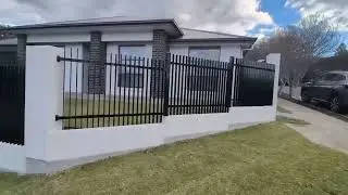 Modern Vertical Blade Fence and Gate with Pillars
