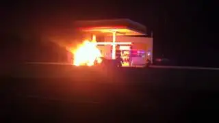 Burning Car at a gas station