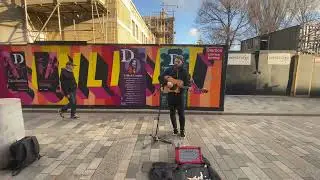 Musician Evan Walsh playing Bob Dylan. Busking in Brighton New Road. Check it out!