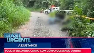 Pol&iacute;cia encontra carro em chamas com corpo dentro | Brasil Urgente