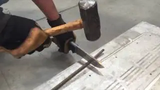 5050 Survival Blade cutting through rebar