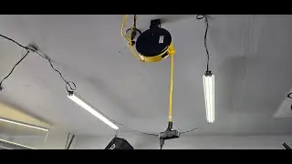 DEWENWILS 30 ft Retractable Extension Cord Reel with 3 outlets mounted in my garage