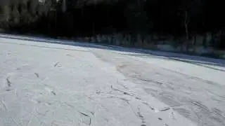 Ice skating on lake Montiggl, Eppan, Southtyrol