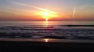 Strand Bergen aan zee zonsondergang