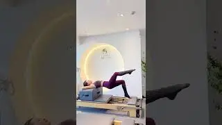 Pilates core bed lifted buttocks straight legs class arrangement combination The buttocks