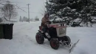 1974 Bolens 1050  pushing snow, first of the year - Workhorse!