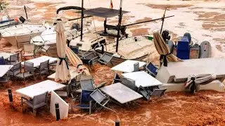 Port with glamorous cars and yachts flooded and washed away in Mallorca, Spain