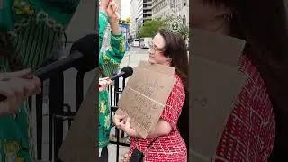 WATCH how this pro-Palestine protestor reacts to us asking her to explain her anti-Semitic sign