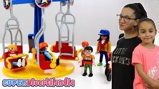 Parque infantil de Playmobil con columpios, toboganes, castillo, balancín y barbacoa