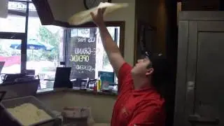 Noah (3rd Generation- Bros. Pizza) making Pizza at Brothers