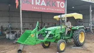 Tractor front loader attachment for construction works