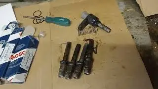 Volvo 740 kjet K Jetronic Injector replacement. Plus belt tightening. MOT news.