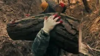short video during the work of lifting wood on the mountain