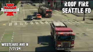 SEATTLE FIRE: A5, B6, E2, E22, E25, E8, L10, L4, L6, M1, M44, SAFT2, STAF10 respond to a roof fire