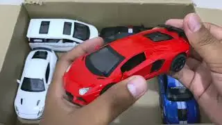 Box Full of Model Cars &ndash; Corvette Stingray, Lotus Evija, BMW M4, Audi R8, Lamborghini Revuelto