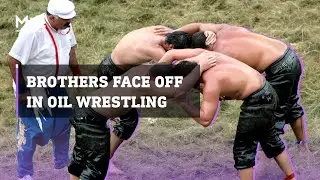Twin brothers face each other in Turkish oil wrestling competition