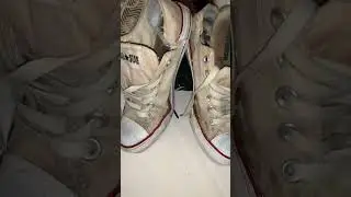 completely worn out girls converse sneakers for the trash can