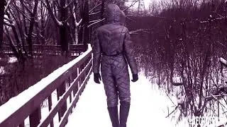 Post-apocalyptic sketch: nuclear winter. Walking creature in steel-colored spacesuit in snow park