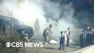 Federal agents use tear gas on Chicago crowds, undercutting temporary restraining order