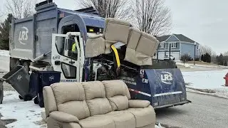 LRS garbage truck on trash 