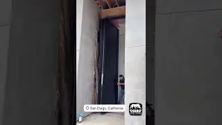 Oversized custom pivot door - big front door - tall security door in San Diego California