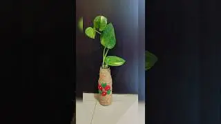 Plant pot from sauce bottle using jute thread and date seeds #diy #craft #plantpot #moneyplant