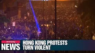 Hong Kong police fire warning shot and use water cannon on protesters