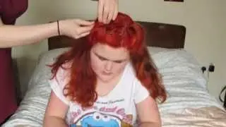 Doing my sister's hair in Victory Rolls!
