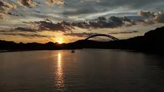 Arc Boats Sunset on Lake Austin by 360 Pennybacker Bridge shot by Lake Austin Design